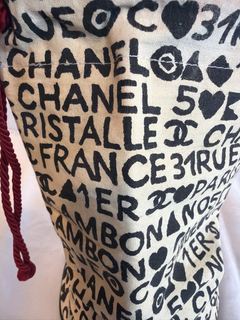 Chanel Coco Cristalle typographic drawstring pouch