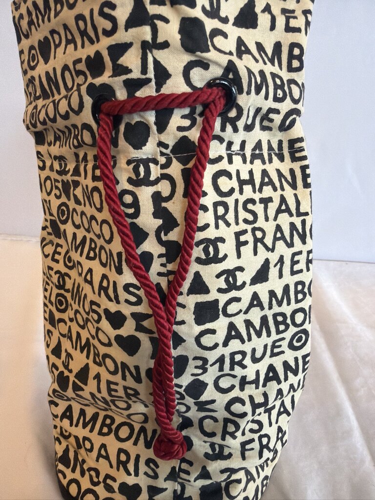 Chanel Coco Cristalle typographic drawstring pouch