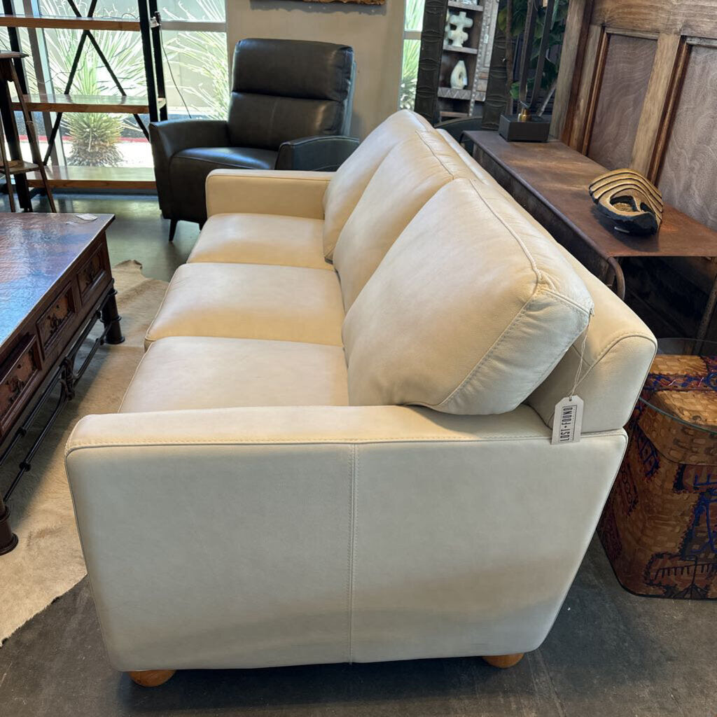 Stationary Solutions Beige Leather Sofa- 76X36X32H