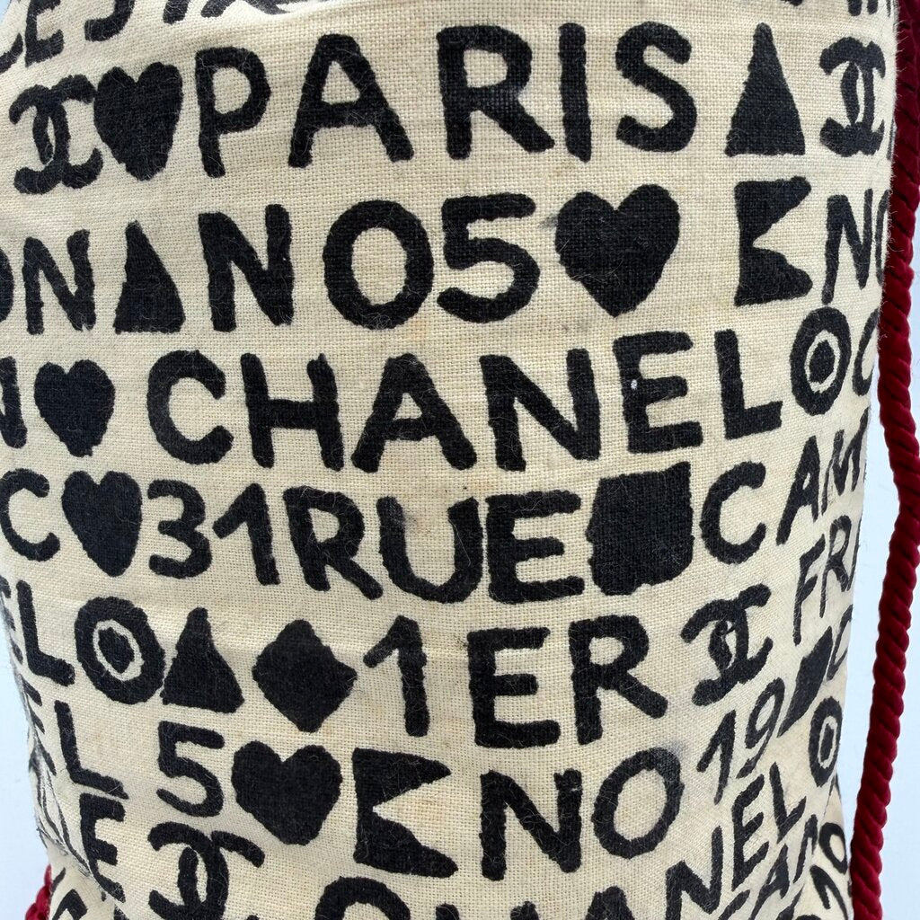 Chanel Coco Cristalle typographic drawstring pouch