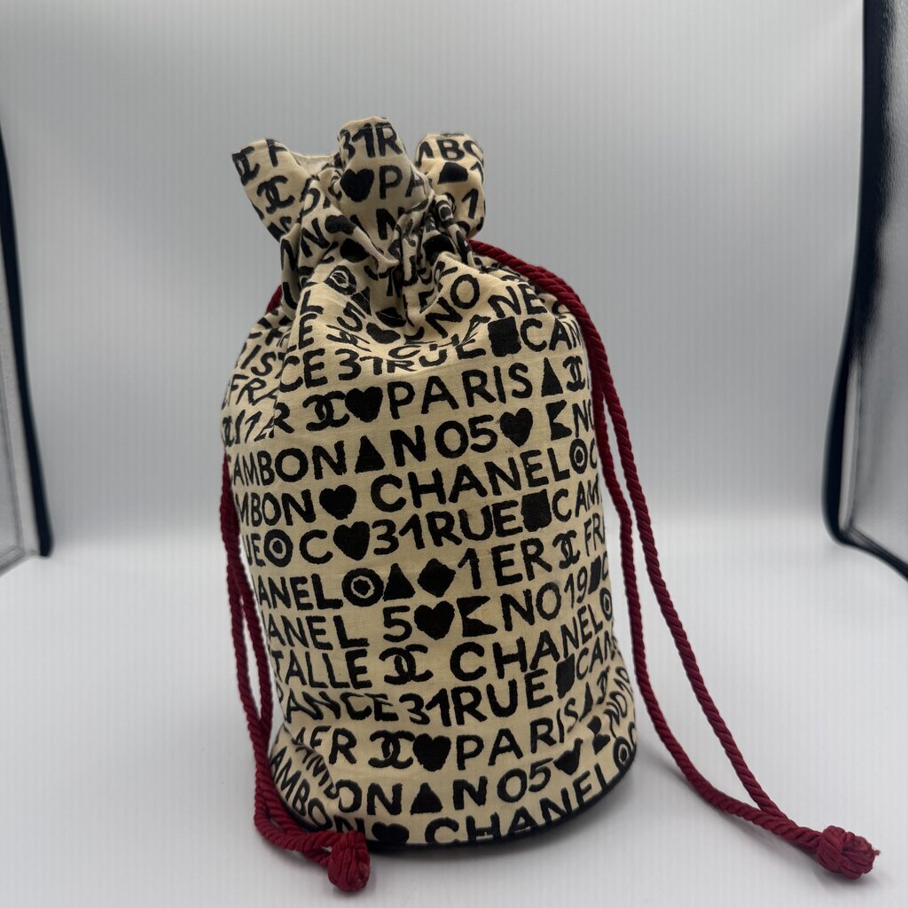 Chanel Coco Cristalle typographic drawstring pouch