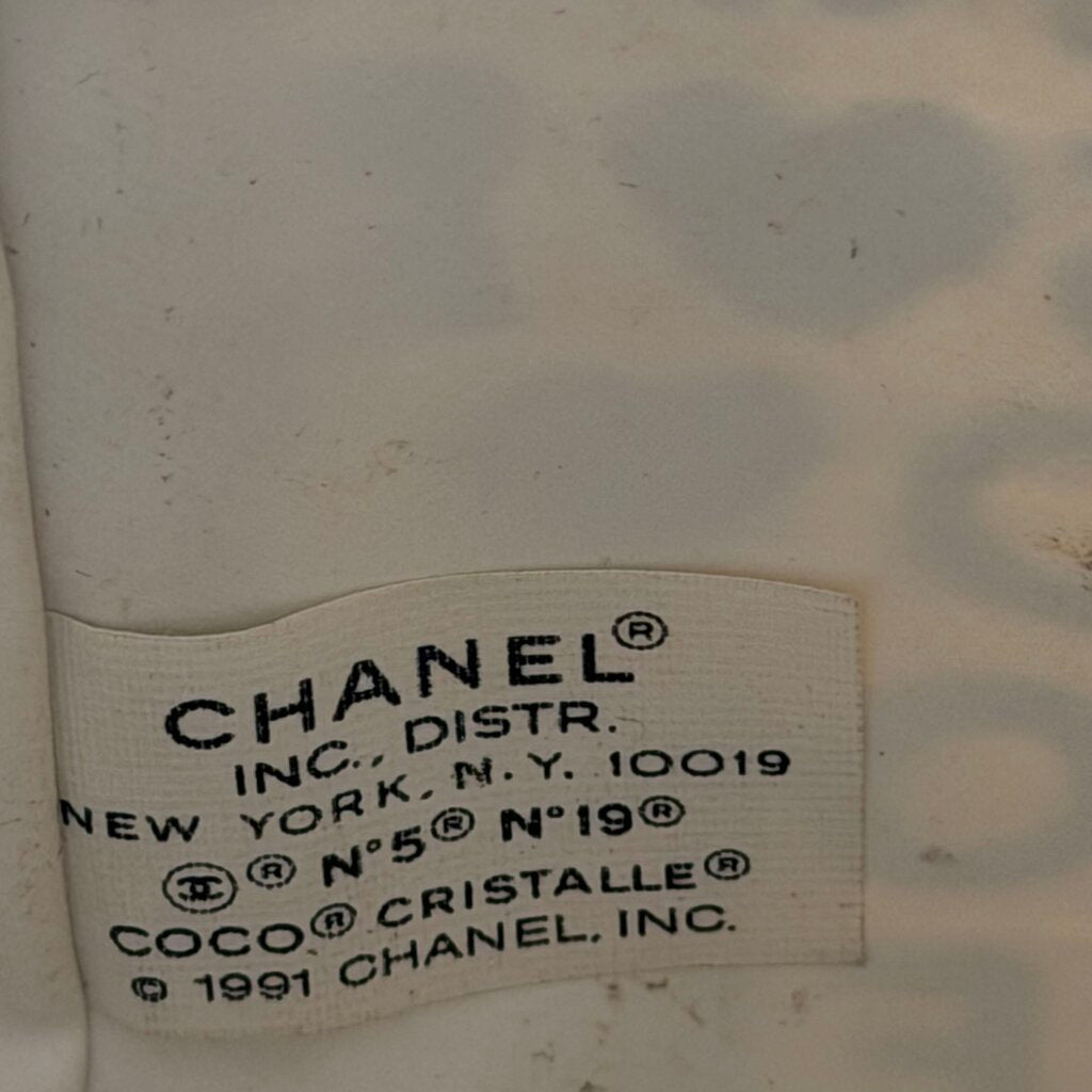 Chanel Coco Cristalle typographic drawstring pouch