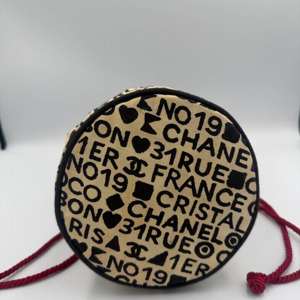 Chanel Coco Cristalle typographic drawstring pouch