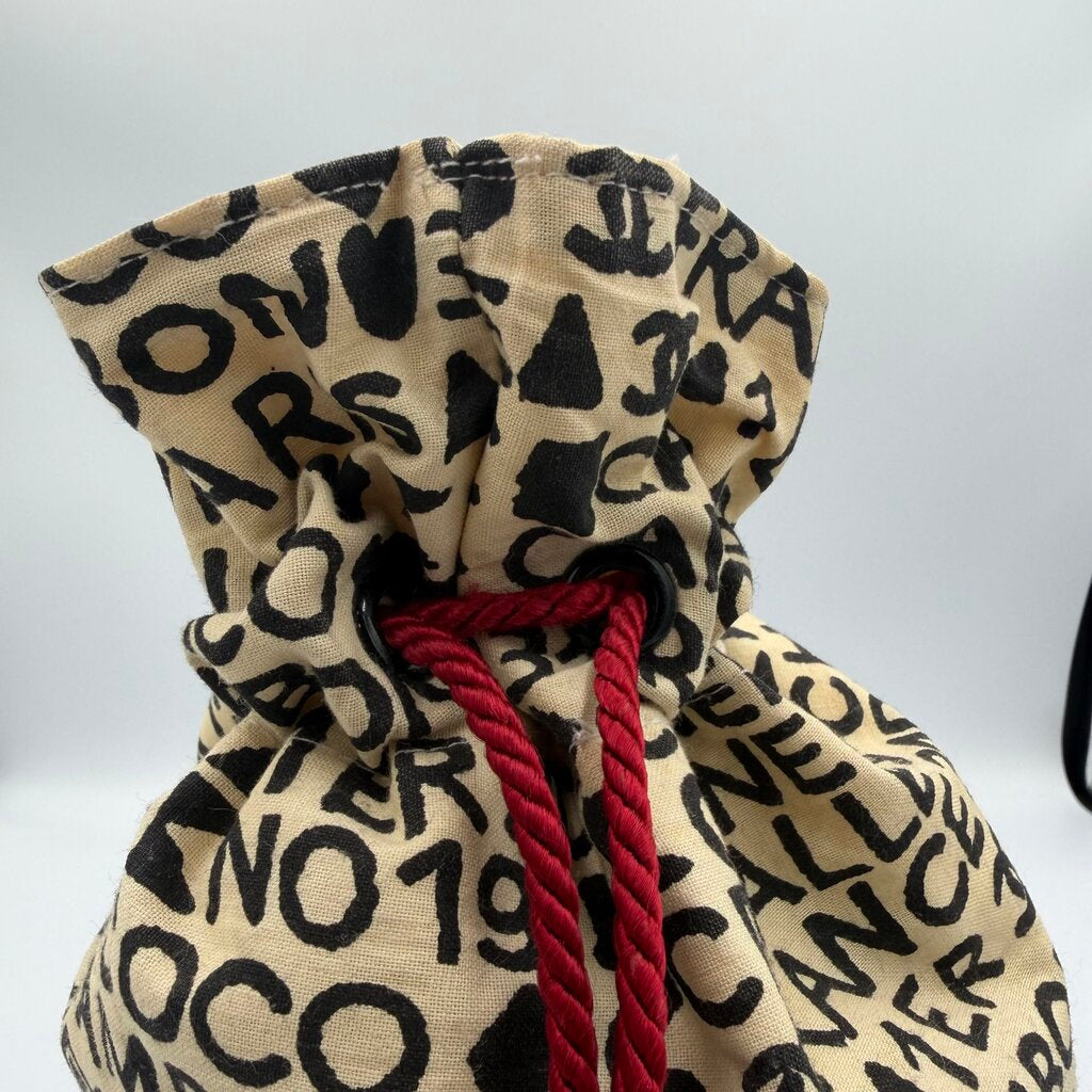 Chanel Coco Cristalle typographic drawstring pouch